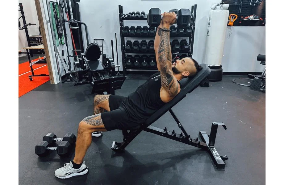 A man doing an incline fly on a Giant 2X Adjustable Bench