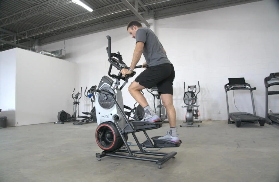 coop using the bowflex max trainer m6