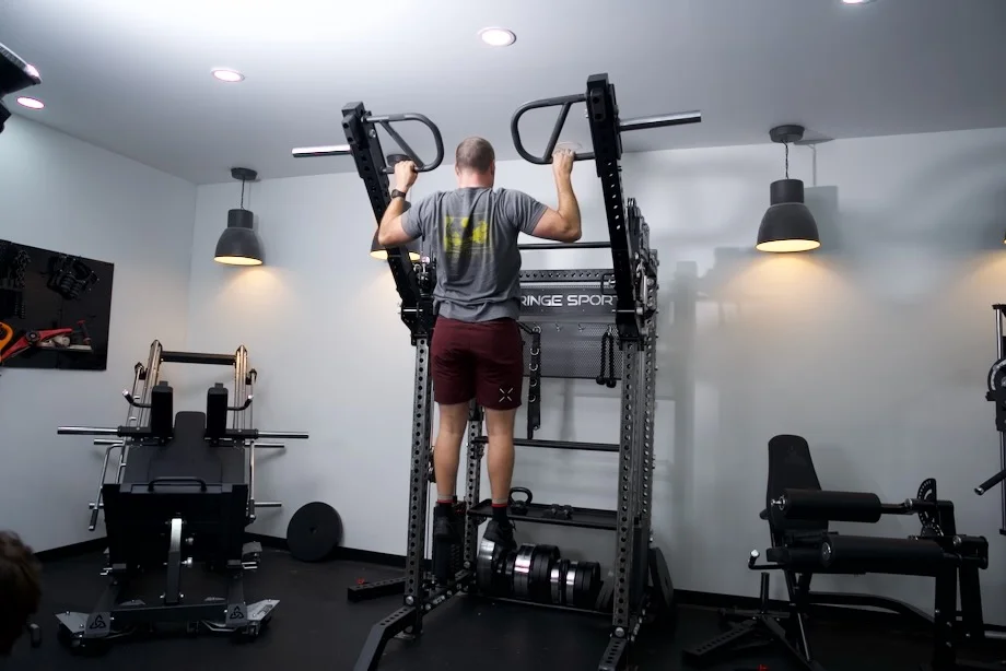 Coop doing a pull-up with the Griffin Adjustable Jammer Arms