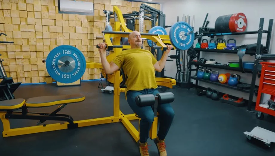 Coop does lat pulldowns on a Powertec Workbench Multistation