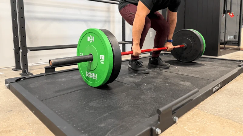 Our tester trying out the Rogue Deadlift Platform in the GGR testing center