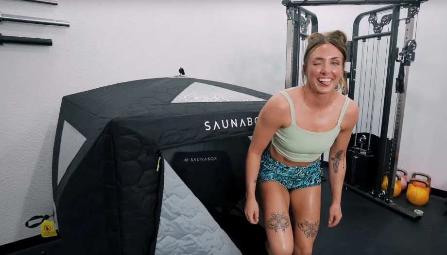 Lindsay Scheele, CPT, climbs out of a SaunaBox Go