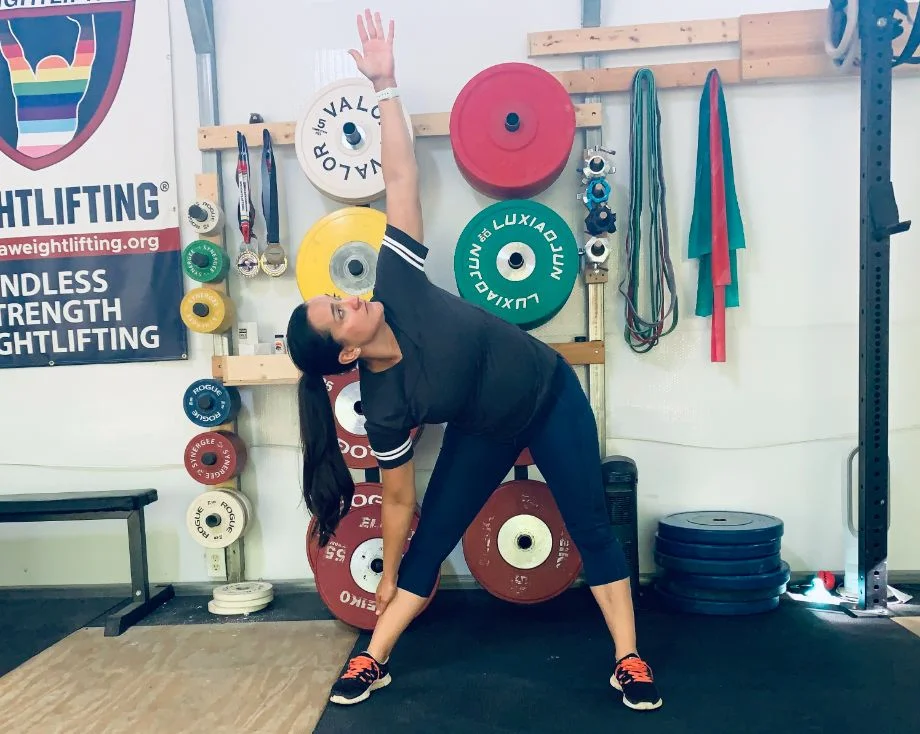 Woman doing a bodyweight windmill