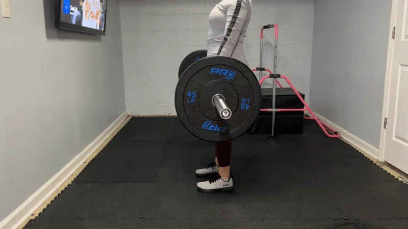 Our tester training with PRx Crumb Rubber Bumper Plates in their home gym