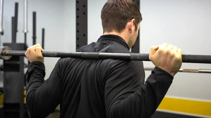 man using the Buddy Capps Texas All American Bar