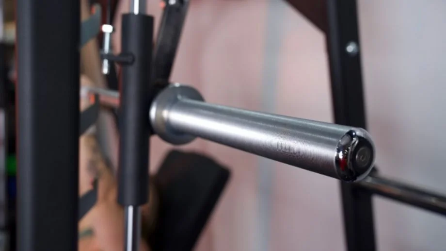 A close look at the bar end cap and sleeve from a Titan Smith Machine.