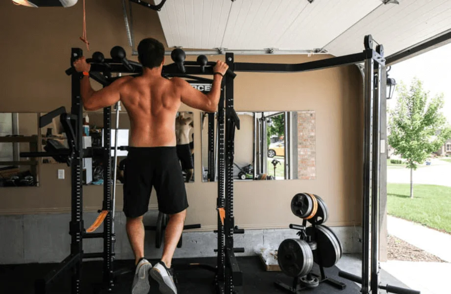 Our tester performing a pull-up on the Force USA Modular MyRack setup