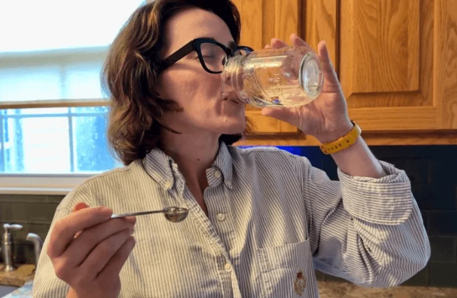 Our tester finishing off their serving of Bioniq Go multivitamin with a refreshing drink of water