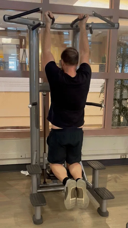 Assisted pull up machine