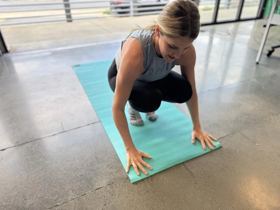Our tester flattening out the Aeromat Elite Yoga Mat