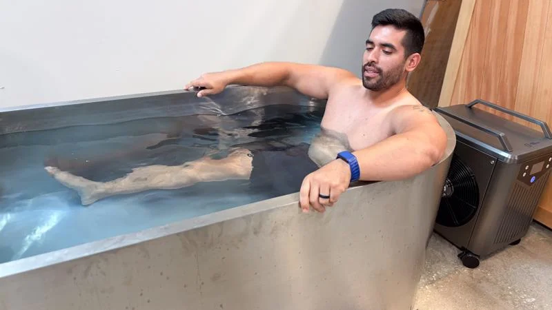 Our product tester soaking in the tub of a Polar Monkeys Contrast Edition Plunge.