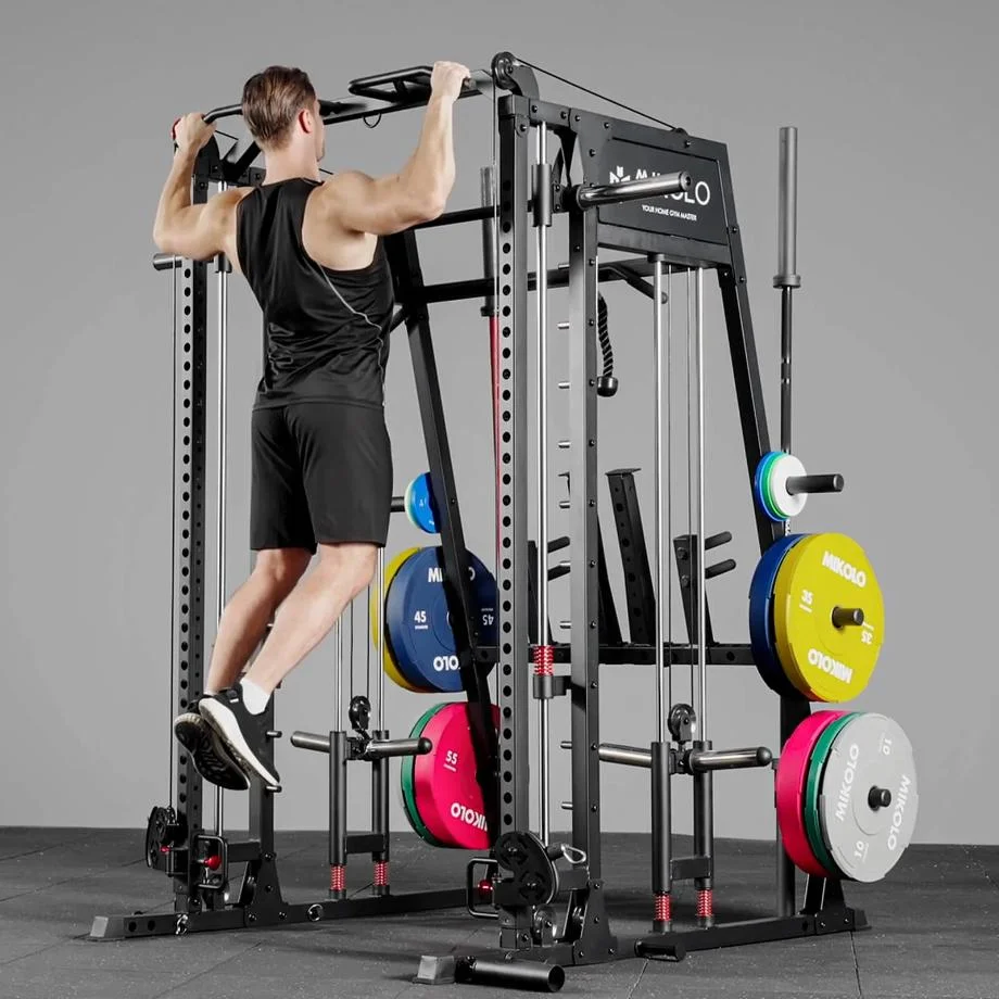 A man performing pull-ups on the Mikolo M4-2.0 Smith Machine