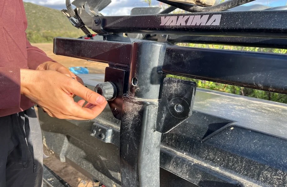 Our tester adjusting and securing the Yakima EXO System With Double-Up Bike Rack