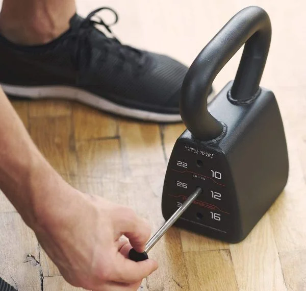 powerblock regular adjustable kettlebell with hand holding pin