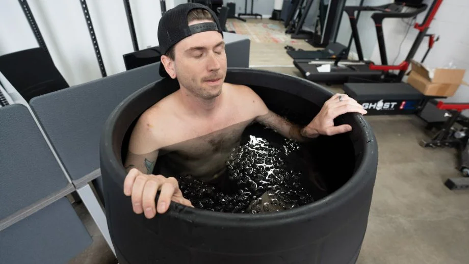 Ice Barrel Sitting Practicing Breathwork