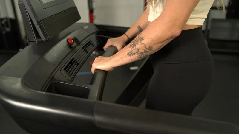 A close look at the front handlebar on a NordicTrack Commercial 1250 treadmill.