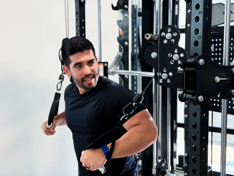 Our tester using the cables on the Major Fitness Heritage Series B17 Flying Fortress All-In-One Functional Trainer.