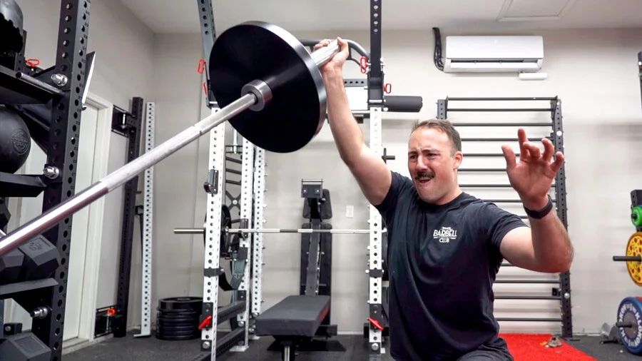 coop working out with the Barbell Shrugged Diesel Dad Training Program shirt