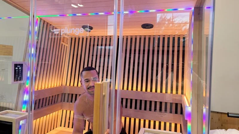 Our product tester in the Plunge Infrared Sauna Pro XL with rainbow lights
