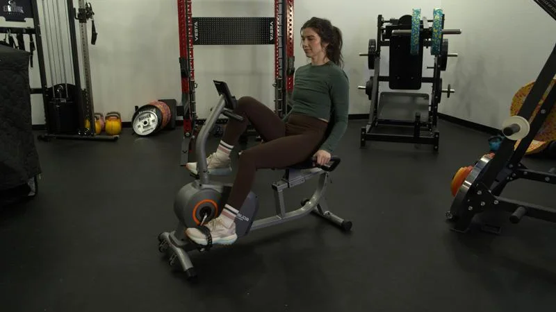 yosuda-rc-pro-recumbent-bike-16 A person riding the YOSUDA Recumbent Exercise Bike.