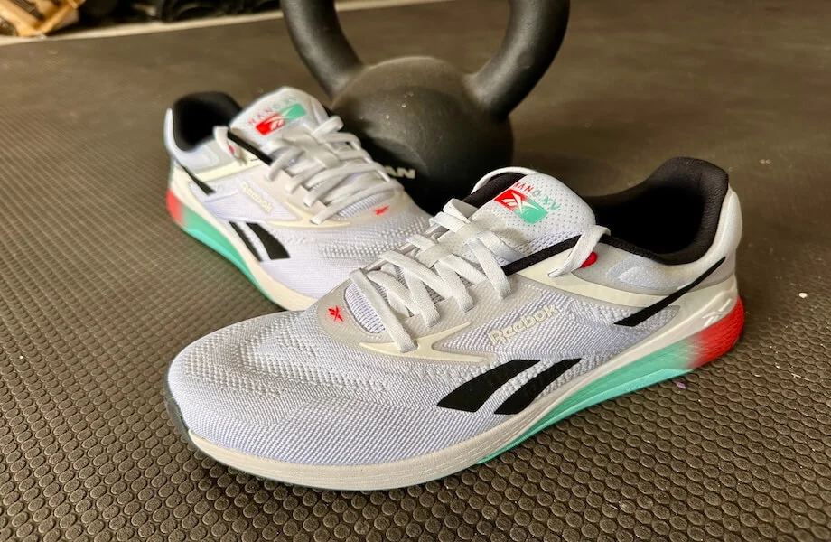Reebok Nano X5 training shoes next to a kettlebell