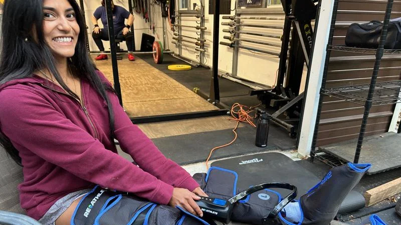 Our tester Using the ReAthlete Air-C Leg Massager compression boots