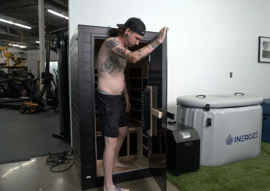 A man stepping inside the SaunaBox Solara