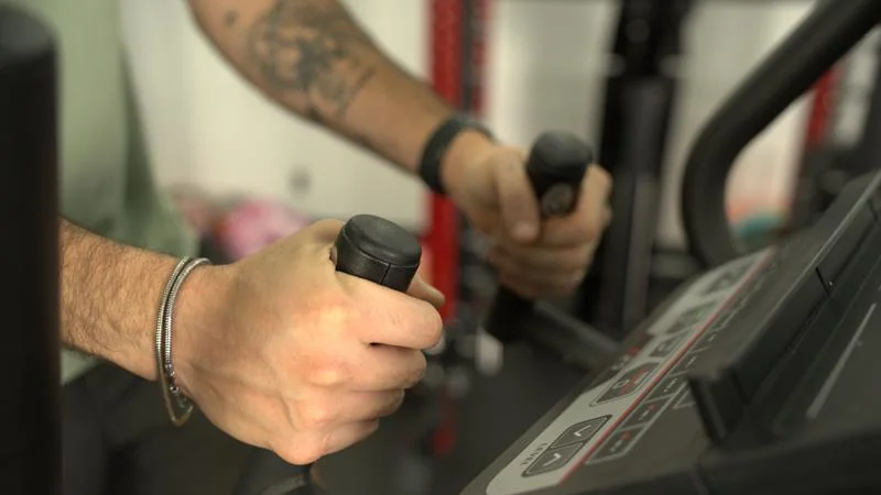 A close look at the handles on a Sole E25 Elliptical.