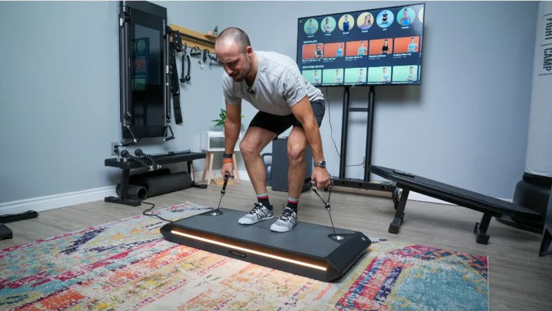 Coop works out with the Vitruvian Trainer+