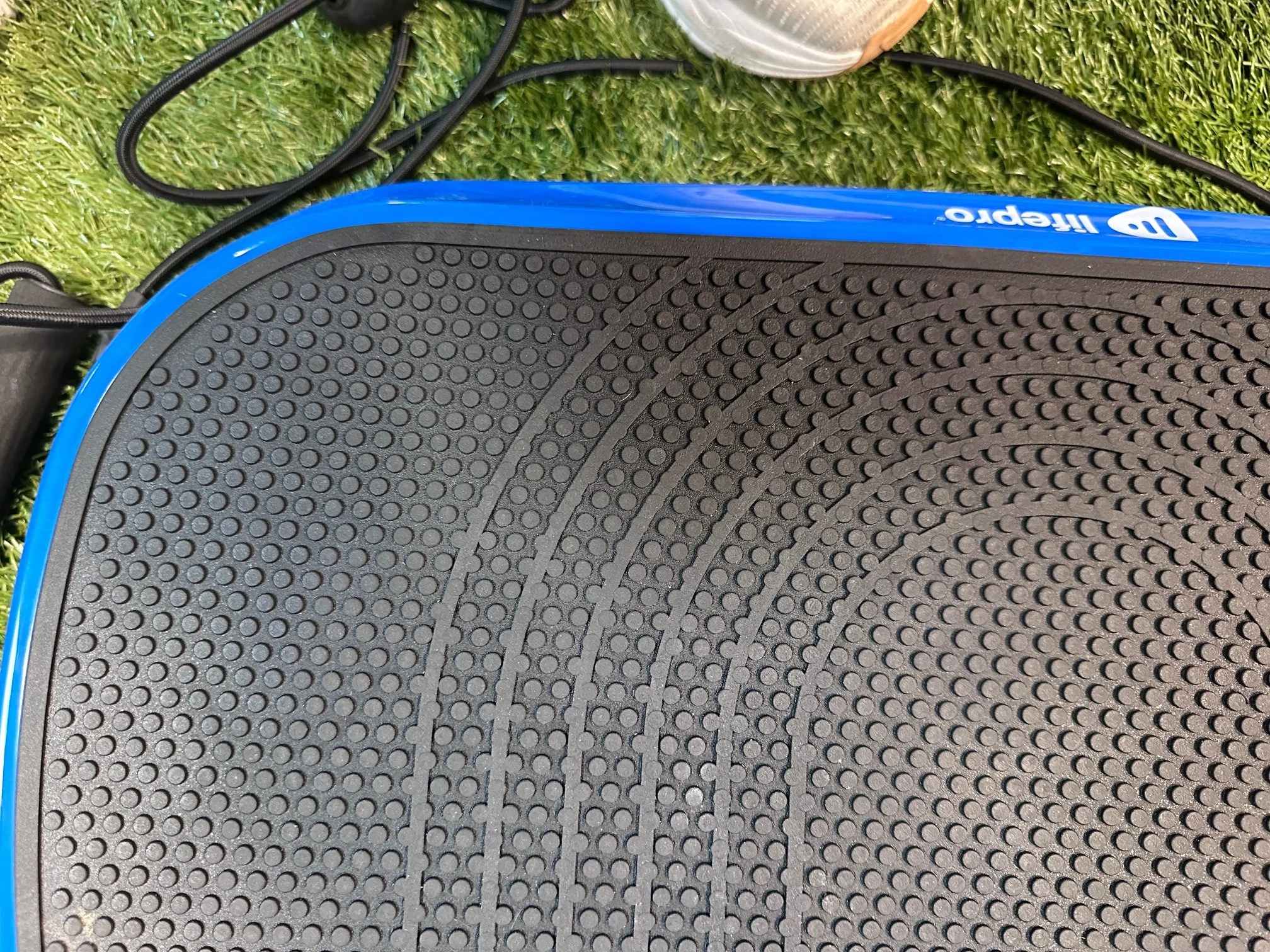A close look at the Textured surface of the LifePro Waver Mini vibration plate.