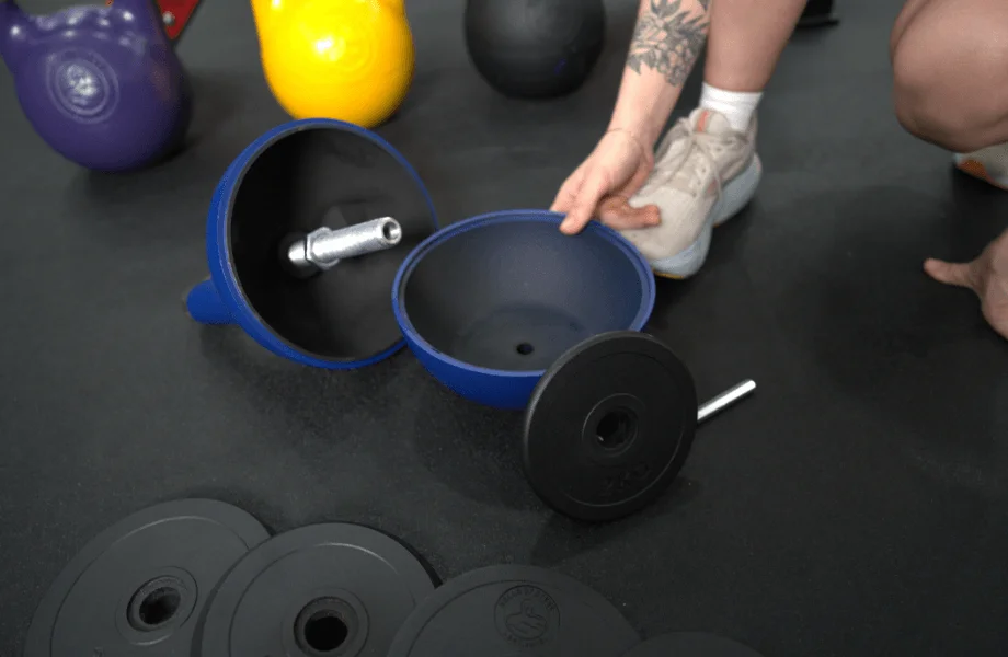 The opened casing of the Bells of Steel Adjustable Competition Style Kettlebell