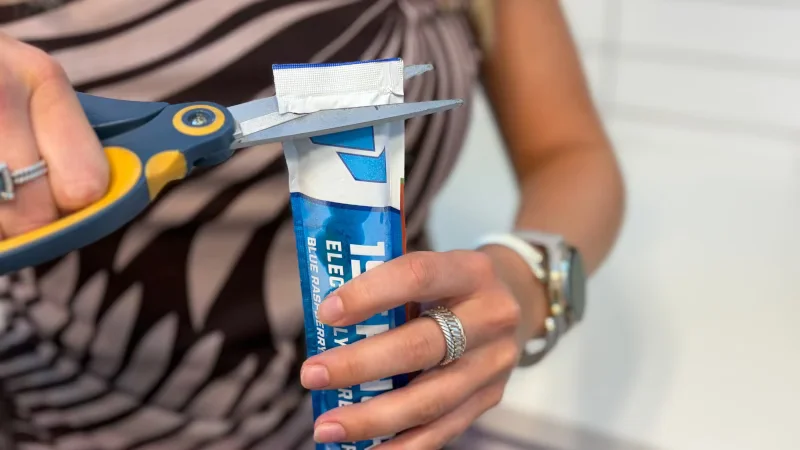 Our product tester opens a 1st Phorm Electrolyte Freezer Pop