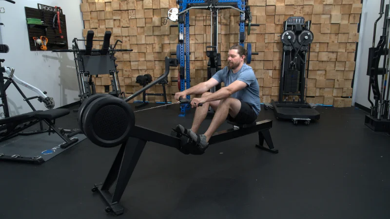 Our tester working out on the YOSUDA Air Magnetic Rowing Machine Pro