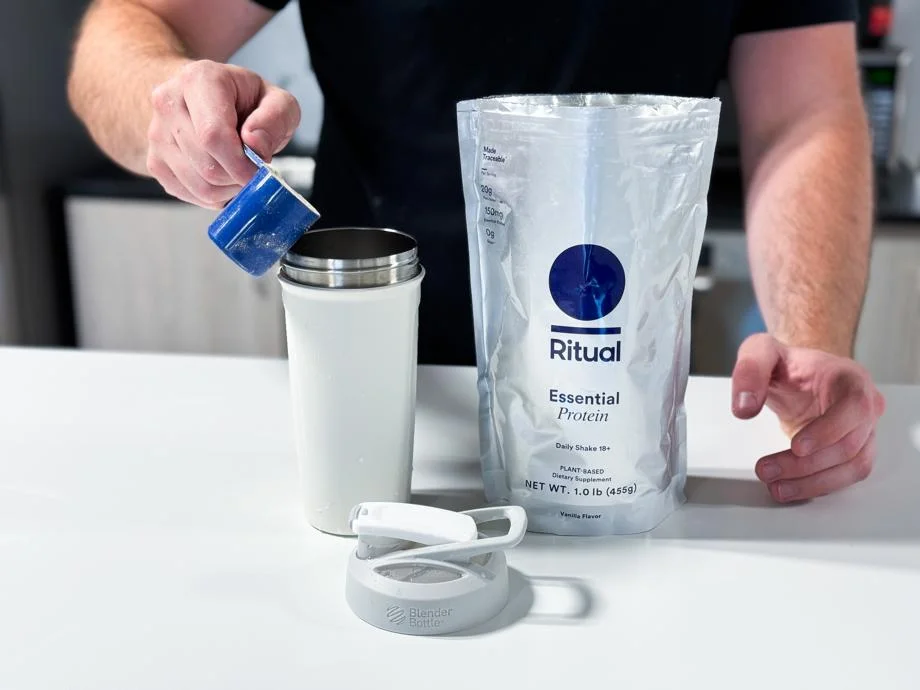 Making a shake with Ritual Essential Protein Daily Shake 18+