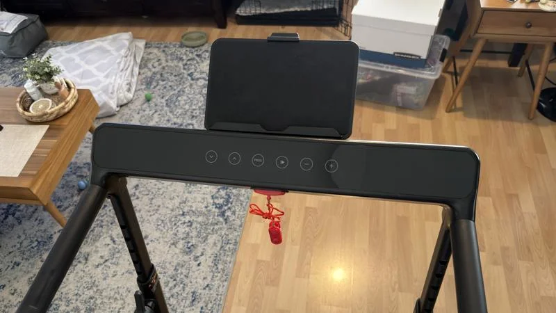 Device holder and touchbar controls on the Urevo FoldiMix 5L Smart Treadmill