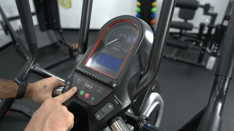 Our tester selecting a workout on the Bowflex Max Trainer M6 center console