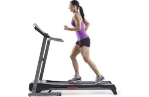 woman using weslo treadmill