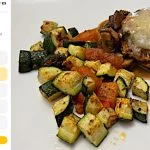 A screenshot of the fitia app quiz about diet preferences next to a plated meal.