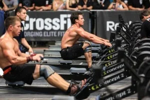men using a rowing machine