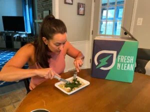 woman eating fresh and lean meal