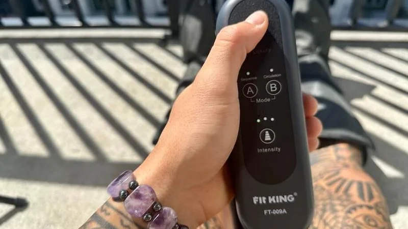 A close look at the controls for a pair of FIT KING Leg Air Massager compression boots
