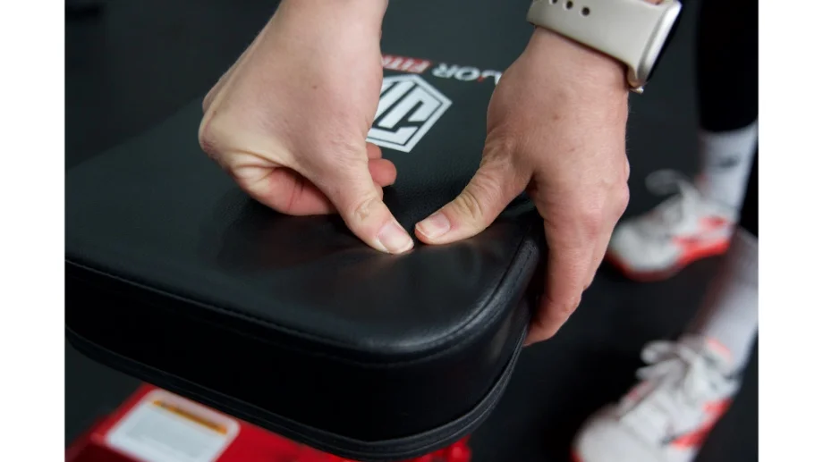 major fitness plt01 adjustable bench close up pressing on seat cushion