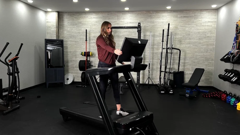 An image of a woman walking on the NordicTrack 1750, one of the best high-end treadmills