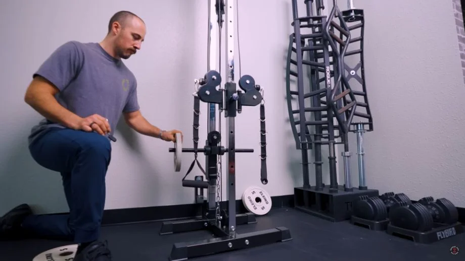 Loading weight on the Titan wall-mounted pulley tower