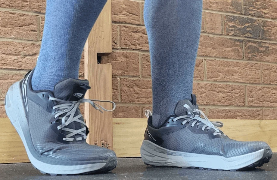 Our teter wearing a pair of Altra Escalante Wild 2 running shoes