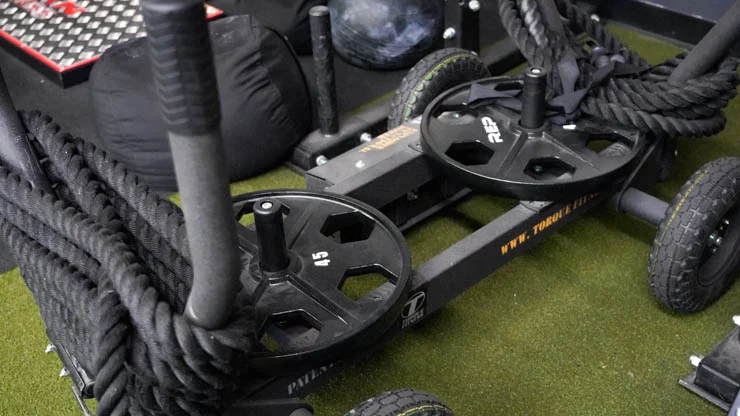 Rep Fitness Equalizer Iron Plates on a torque sled