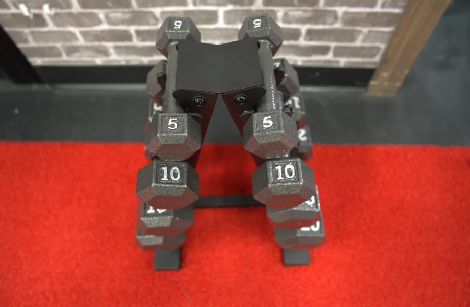 CAP Cast Iron Hex Dumbbells on a weight tree