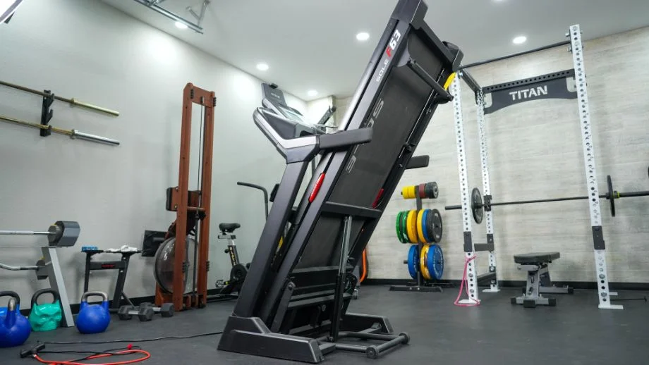 The Sole F63 treadmill in its folded position
