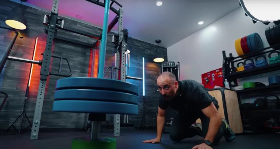 Coop does a hold test on Titan TwistLock Barbell Collars.