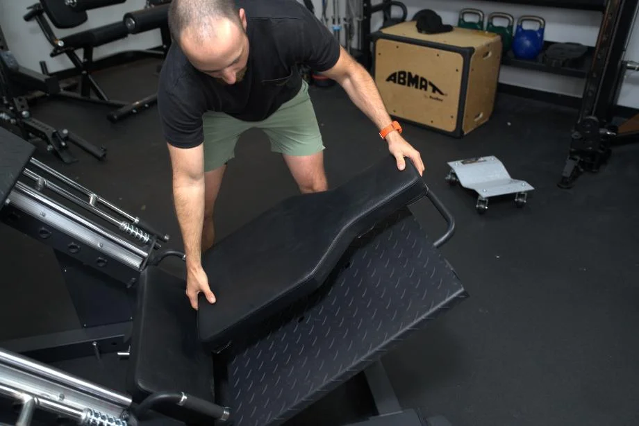 The backrest on a Bolt Fitness Hack Squat Leg Press machine